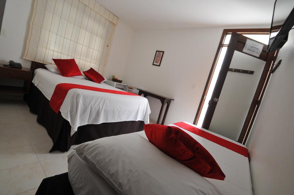 Hotel San Julian Buga Szoba fotó